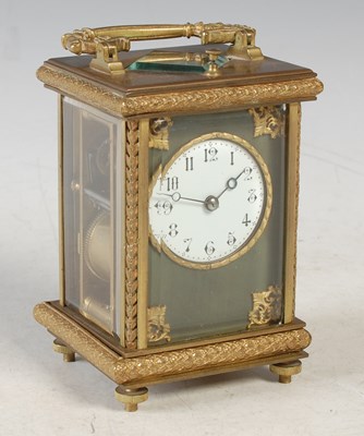 Lot 23 - A late 19th/ early 20th century brass cased...