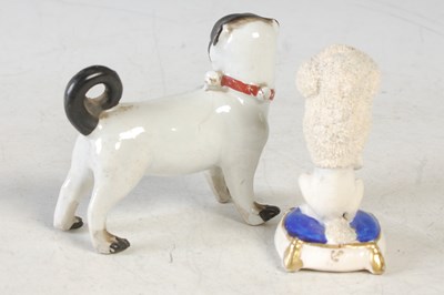 Lot 28 - Two Antique ceramic figures of dogs to include...