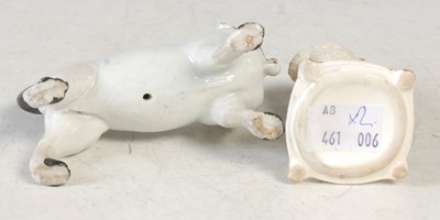 Lot 28 - Two Antique ceramic figures of dogs to include...