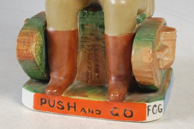 Lot 29 - A Wilkinson Pottery toby jug, modelled as...