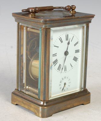 Lot 33 - A late 19th/ early 20th century brass carriage...