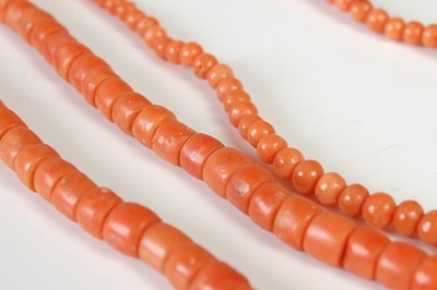 Lot 37 - Two early 20th century red coral necklaces, in...