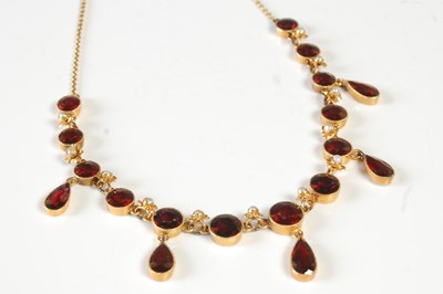 Lot 40 - An Edwardian yellow metal, garnet and seed...
