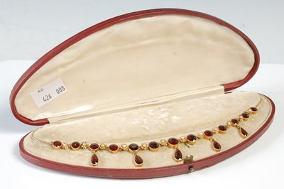 Lot 40 - An Edwardian yellow metal, garnet and seed...
