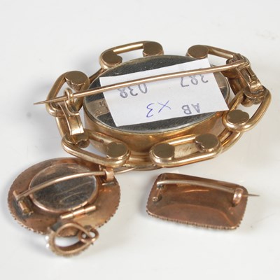 Lot 45 - A group of three yellow metal mourning...