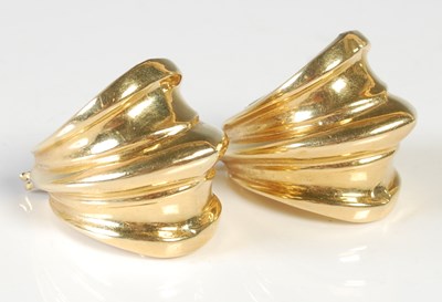 Lot 52 - A pair of yellow metal earrings, stamped '750',...