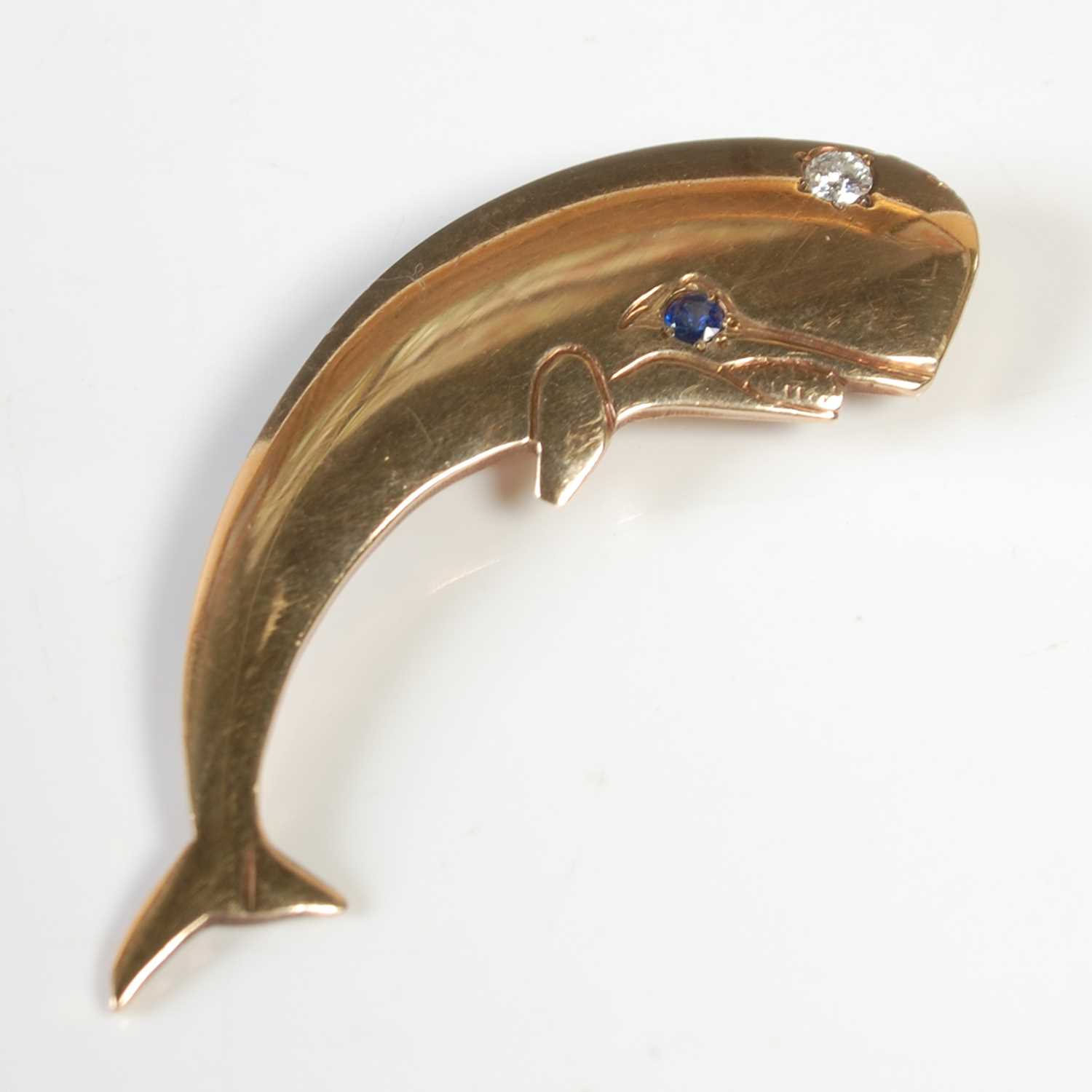 Lot 54 - A yellow metal, sapphire and diamond set...