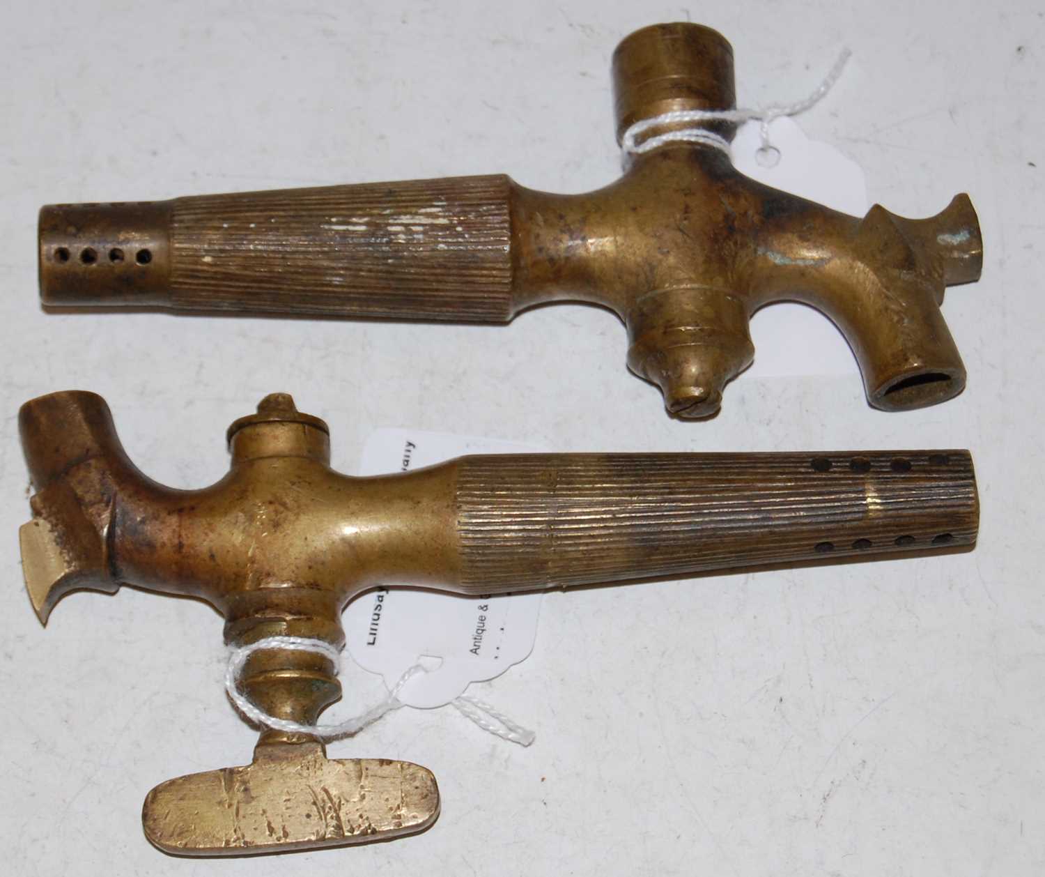 Lot 93 - Two vintage brass whisky barrel taps