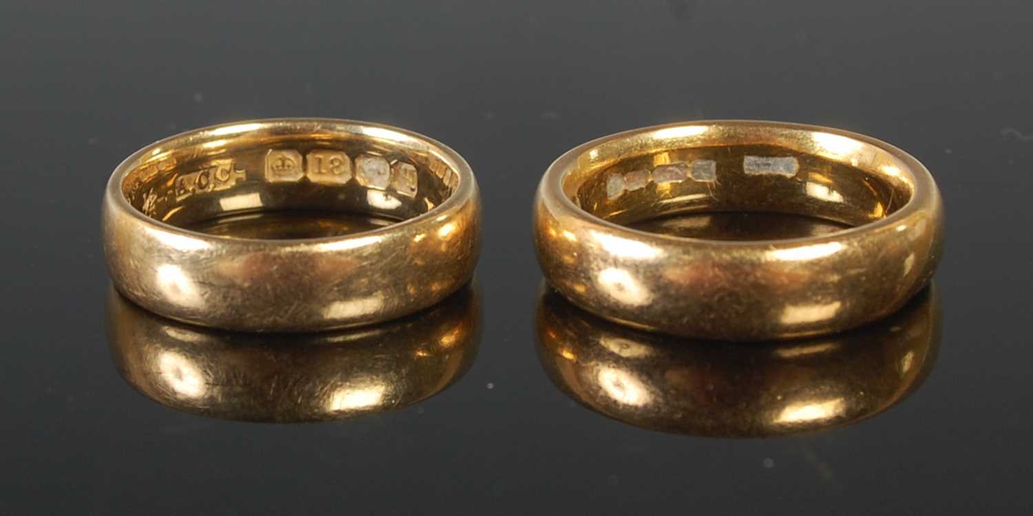 Lot 55 - Two gold rings to include an 18ct gold wedding...