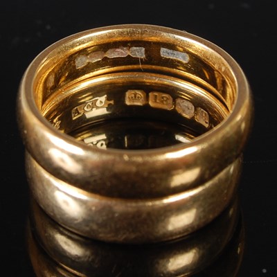 Lot 55 - Two gold rings to include an 18ct gold wedding...