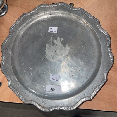 Lot 564 - An 18th century Dutch pewter shaped circular...