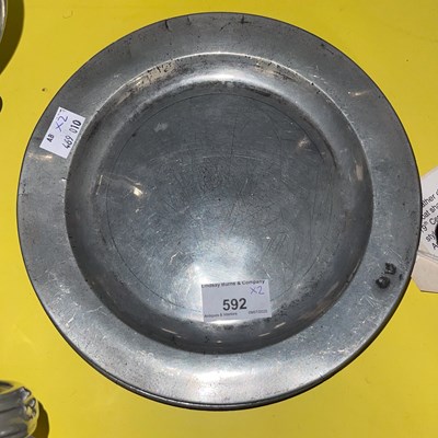 Lot 592 - A pair of 18th century pewter dinner plates...