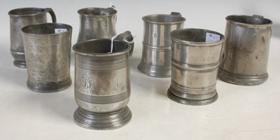 Lot 429 - Five 19th century pewter half-pint mugs: one...
