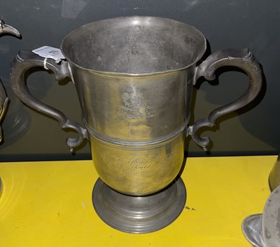 Lot 579 - An 18th century pewter two handled cup on...
