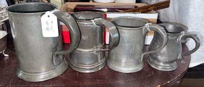 Lot 486 - An 18th century large pewter tapering...