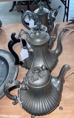 Lot 569 - A Britannia metal fluted pear-shaped teapot...