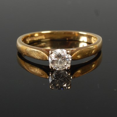 Lot 61 - An 18ct gold and diamond set solitaire ring,...