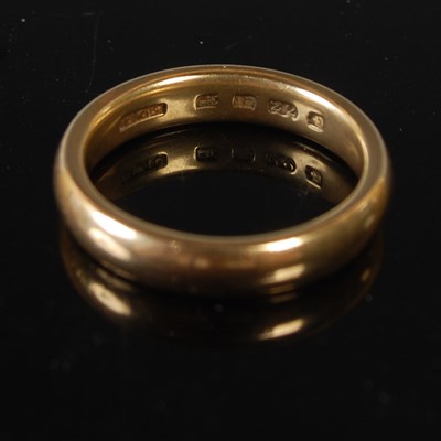 Lot 73 - A 22ct gold wedding ring, size M, 7 grams.