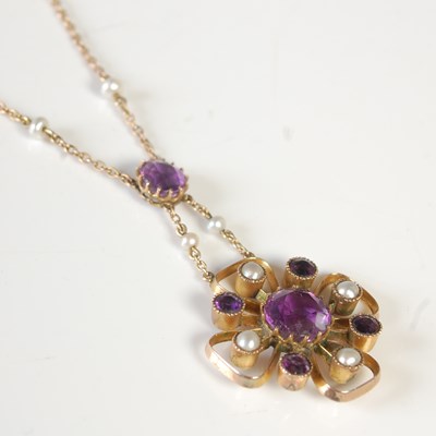 Lot 80 - An early 20th century yellow metal, amethyst...