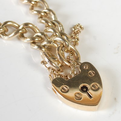 Lot 84 - A 9ct gold bracelet with 9ct gold heart shaped...