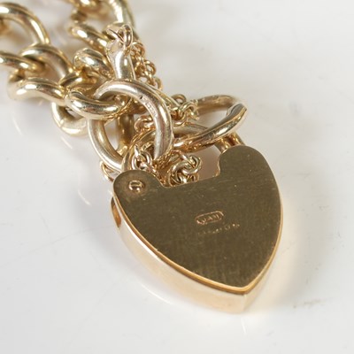 Lot 84 - A 9ct gold bracelet with 9ct gold heart shaped...
