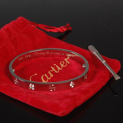 Lot 87 - A facsimile Cartier style 'Love' bracelet,...