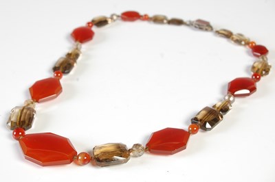 Lot 96 - An Art Deco style carnelian and smoky quartz...