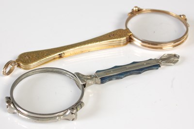 Lot 104 - Two pairs of lorgnettes, one yellow metal; the...