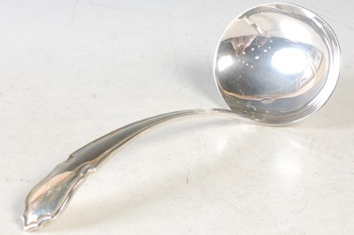 Lot 150 - An Elizabeth II Sheffield silver ladle, the...