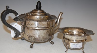 Lot 100 - A Birmingham silver teapot raised on four...