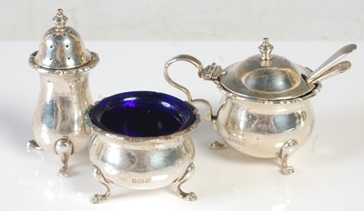 Lot 165 - A Birmingham silver three piece cruet set,...