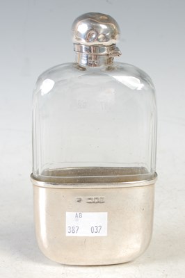 Lot 177 - A London silver mounted clear glass hip flask,...