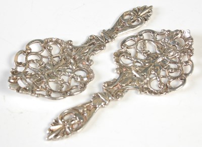 Lot 180 - A pair of Sheffield silver caddy spoons, the...