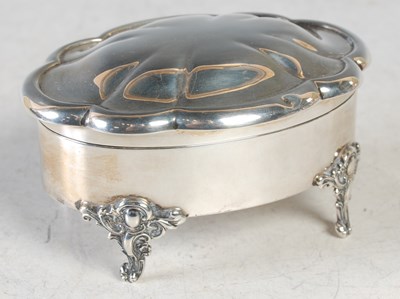 Lot 210 - A Sheffield silver oval shaped dressing table...