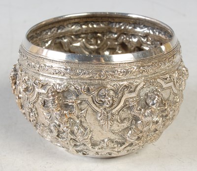 Lot 215 - An Indian/ Burmese silver bowl, embossed with...