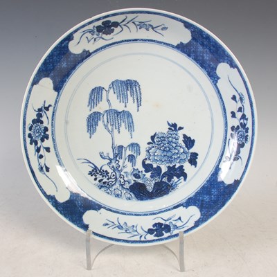 Lot 277 - A Chinese porcelain blue and white dish, Qing...