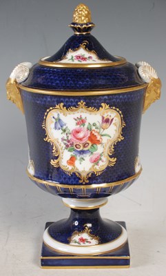 Lot 287 - A Royal Worcester porcelain urn and cover in...