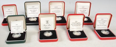 Lot 301 - A collection of eight Royal Mint silver proof...