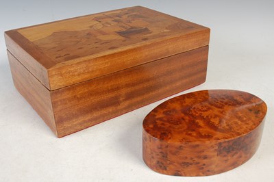 Lot 355 - A burr wood oval shaped jewellery box, 18cm...