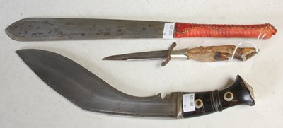 Lot 360 - A vintage kukri knife; a dagger with handle...