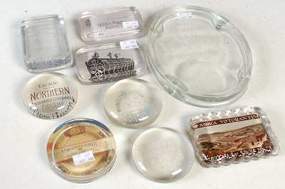 Lot 397 - A collection of nine assorted glass...
