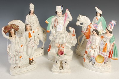 Lot 404 - A group of six assorted Staffordshire flatback...