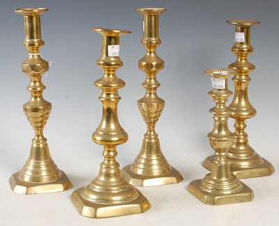 Lot 415 - Two pairs of Antique brass ejector...