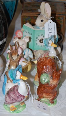 Lot 318 - A group pf Beatrix Potter figures to include...