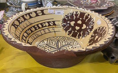 Lot 455 - A Seaton pottery slip glazed bowl, inscribed...