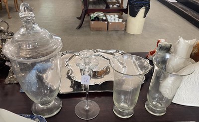 Lot 472 - A clear glass jar and cover, 46cm high; a pair...