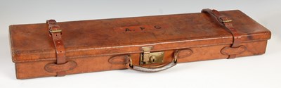 Lot 156 - A late 19th/ early 20th century leather gun...