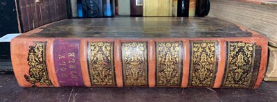 Lot 500 - A re-bound leather Holy Bible, printed by John...