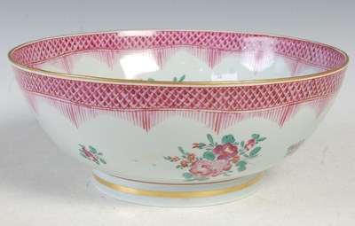 Lot 505 - A Famille Rose style punch bowl, decorated...