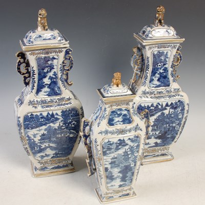 Lot 506 - A garniture of three Chinese porcelain blue...